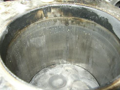 Scored cylinder due to silicon from an unfiltered landfill gas